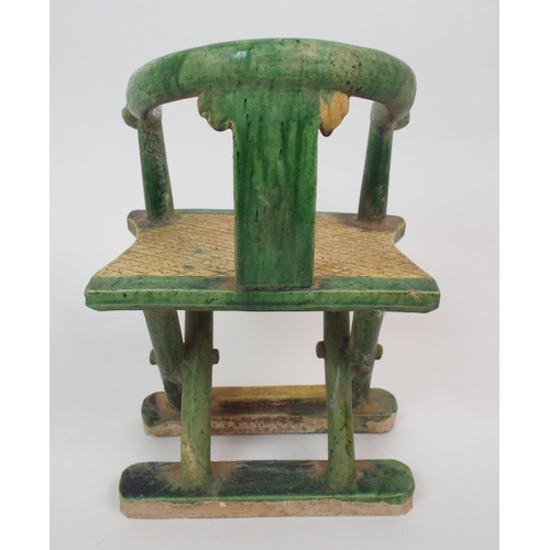 100 - A Tang style horse-shoe back armchair