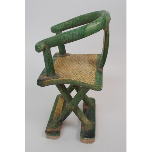 100 - A Tang style horse-shoe back armchair