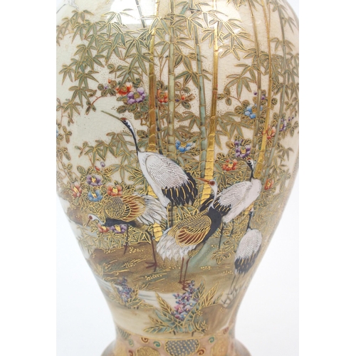 106 - A Satsuma two-handled baluster vase