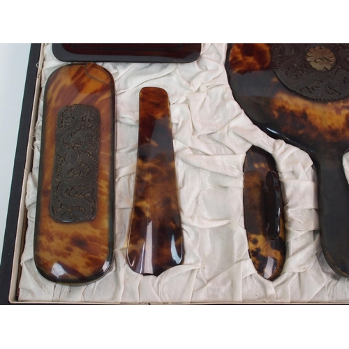 109 - A Japanese tortoiseshell cased brush set