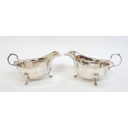 141 - A pair of silver sauceboats