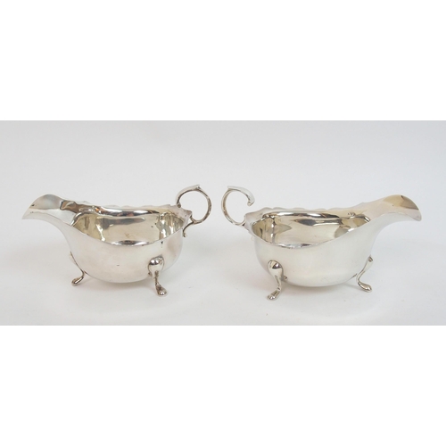 141 - A pair of silver sauceboats