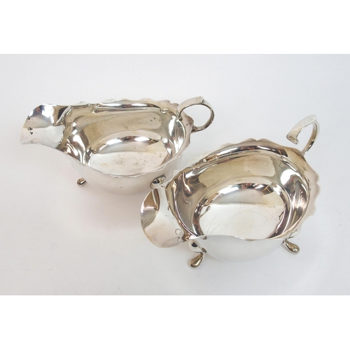 141 - A pair of silver sauceboats