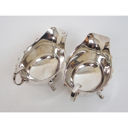 141 - A pair of silver sauceboats