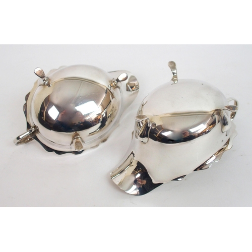 141 - A pair of silver sauceboats