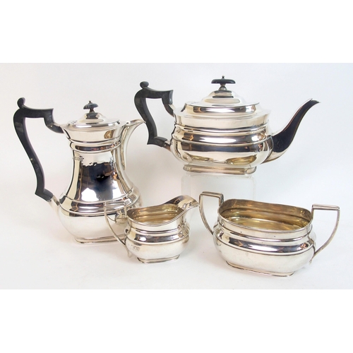 143 - A four piece silver tea service