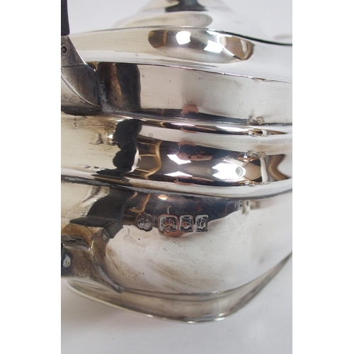 143 - A four piece silver tea service