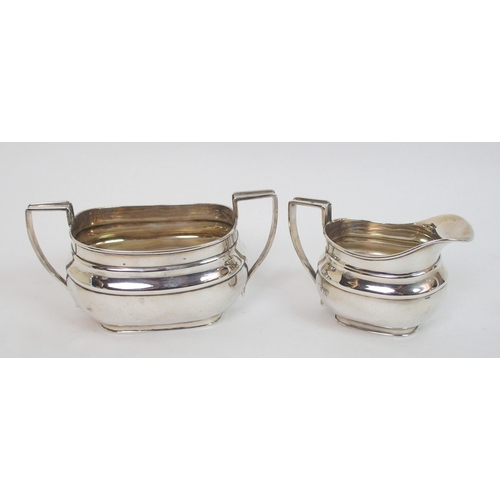 143 - A four piece silver tea service