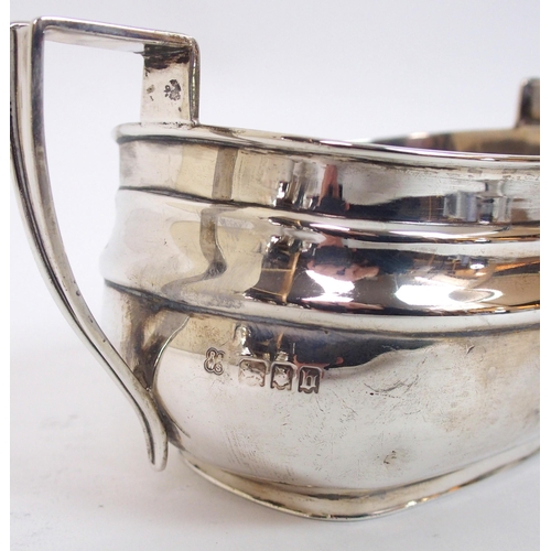 143 - A four piece silver tea service