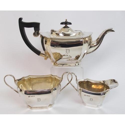 144 - A three piece silver tea service