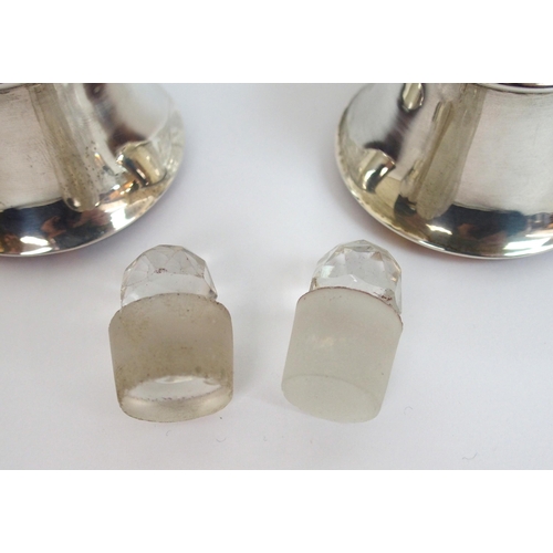 147 - A pair of silver topped scent bottles