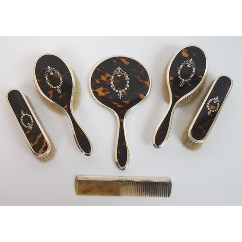 148 - A six piece silver and tortoiseshell dressing table set