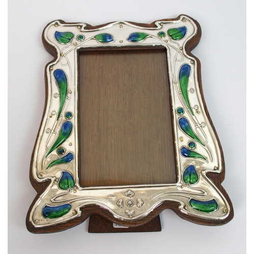 155 - An Art Nouveau silver photo frame