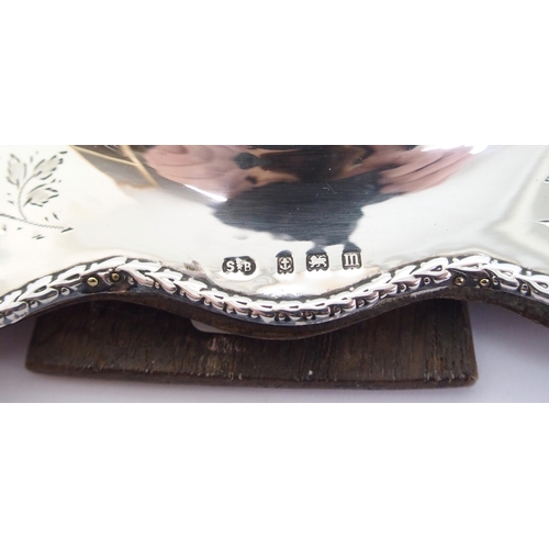 156 - An Edwardian silver mounted photo frame