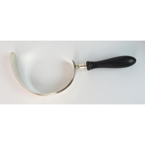 162 - A Scottish silver scoop / cream skimmer