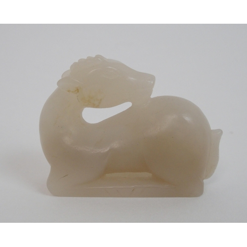 24 - A Chinese hardstone mutton fat carving of a recumbent deer