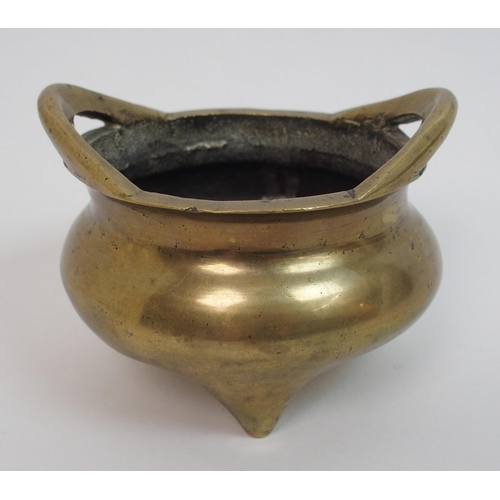 37 - A Chinese brass two-handled censer