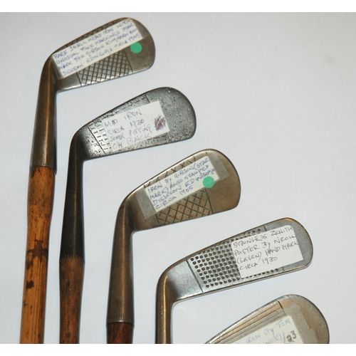 374 - A collection of sixteen various hickory-shafted putters and irons