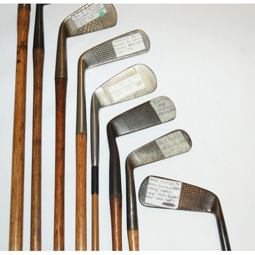 374 - A collection of sixteen various hickory-shafted putters and irons