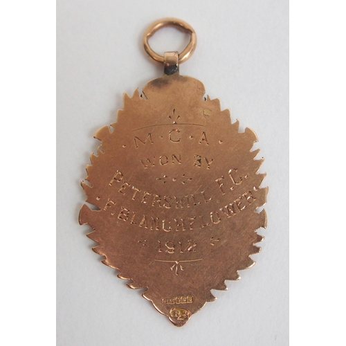 381 - A 9ct gold and enamel Scottish Junior football medal