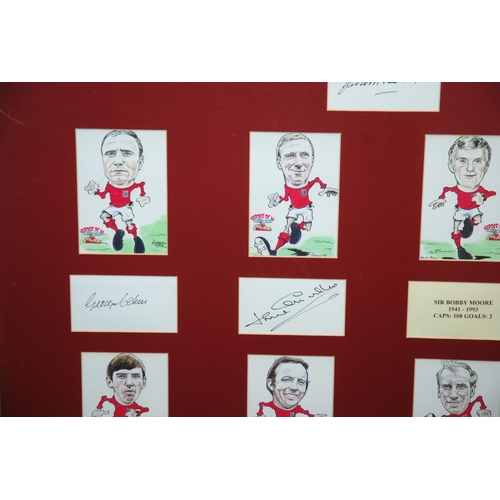 385 - England 1966 World Cup: A framed display comprising nine player autographs