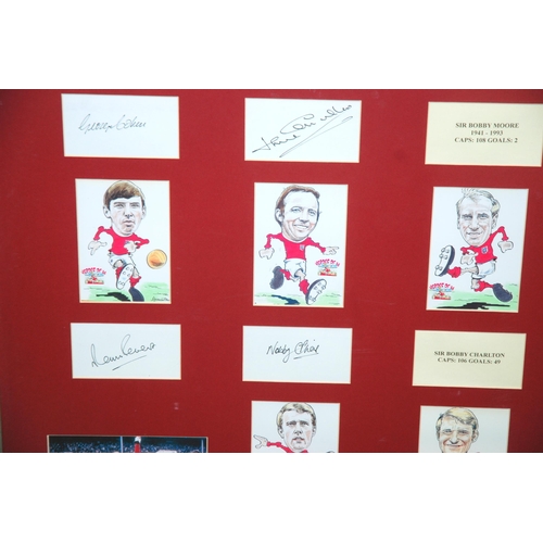 385 - England 1966 World Cup: A framed display comprising nine player autographs