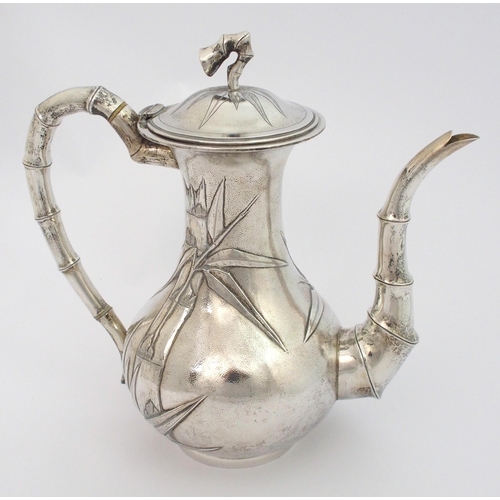 4 - A Chinese silver baluster teapot