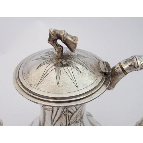 4 - A Chinese silver baluster teapot