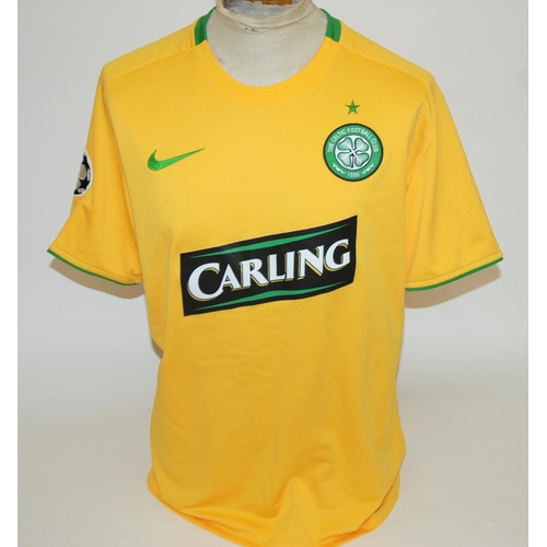 405 - A yellow Celtic Champions League short-sleeved shirt