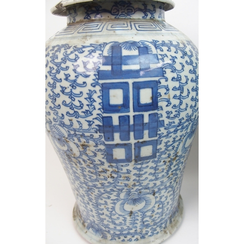 41 - Two Chinese blue and white baluster jars and domed covers