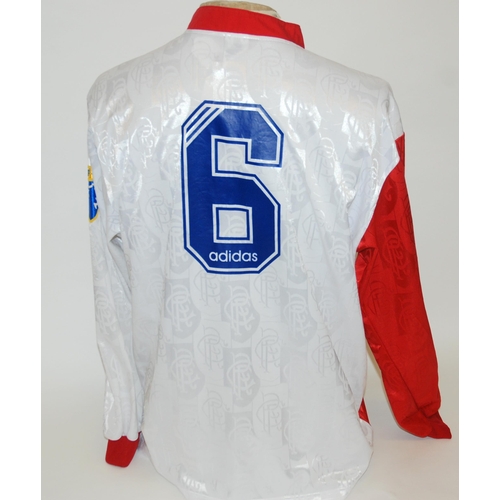 411 - A white Rangers shirt