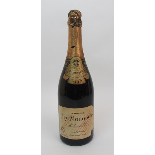 454A - A bottle of 1937 Dry Monopole champagne