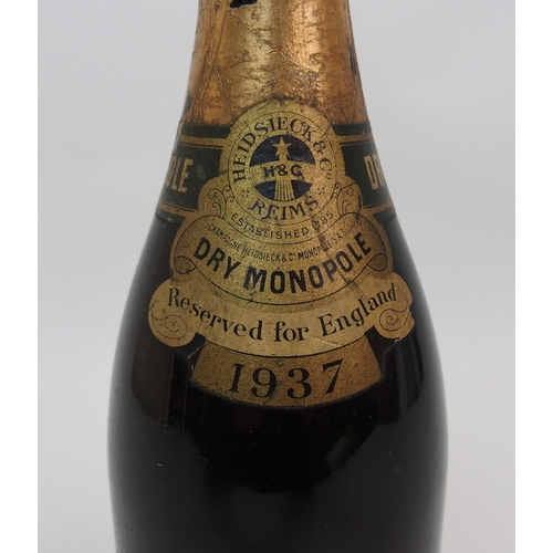 454A - A bottle of 1937 Dry Monopole champagne