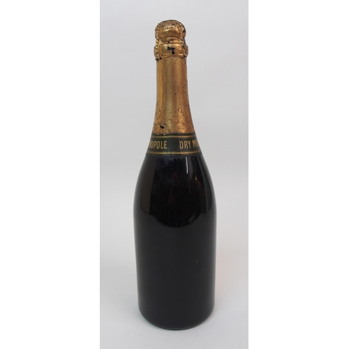 454A - A bottle of 1937 Dry Monopole champagne