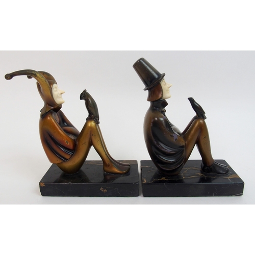 472 - Attributed to Roland Paris - a pair of cold painted bronze and ivory jester bookends