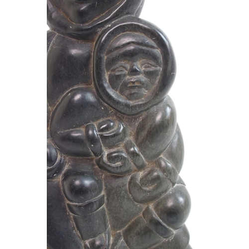 479 - An Inuit carved soapstone sculpture of a mother and child