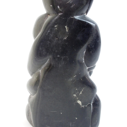 479 - An Inuit carved soapstone sculpture of a mother and child