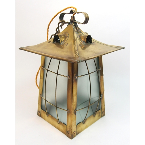 483 - An Arts and Crafts brass hall lantern