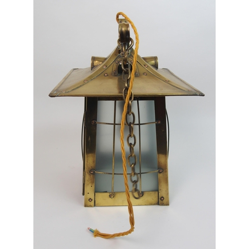 483 - An Arts and Crafts brass hall lantern