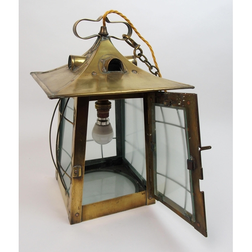 483 - An Arts and Crafts brass hall lantern