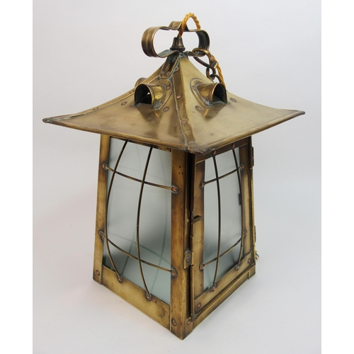 483 - An Arts and Crafts brass hall lantern