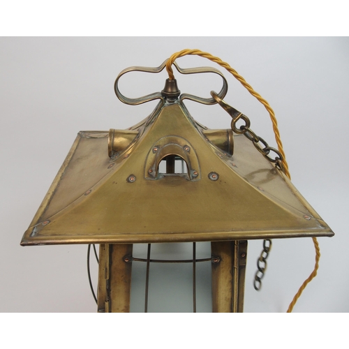 483 - An Arts and Crafts brass hall lantern