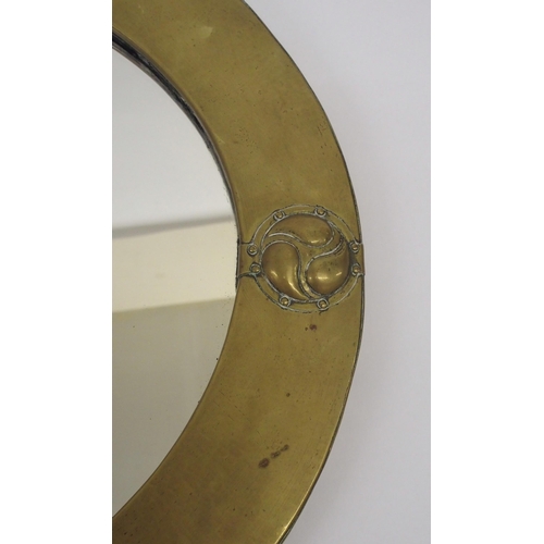 484 - A Liberty design Arts and Crafts brass framed mirror