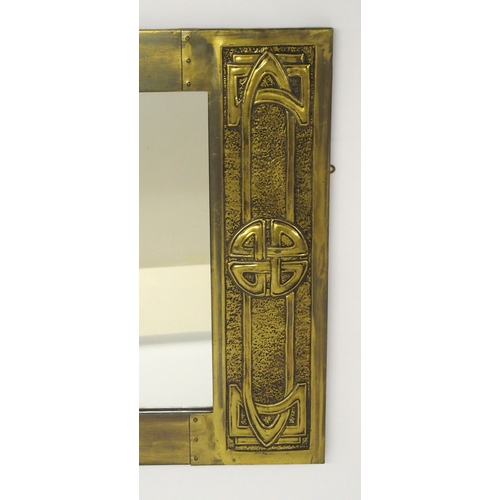 485 - A Glasgow School Arts and Crafts Margaret Gilmour design brass framed mirror