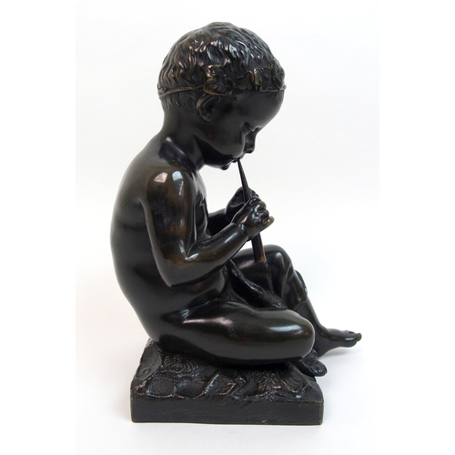 493 - A 20th Century bronze of a small boy playing a pipe