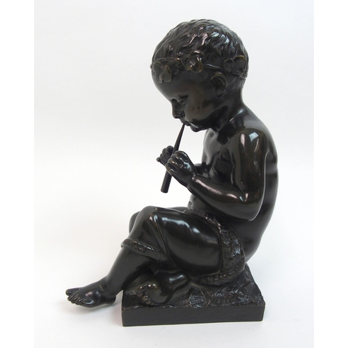 493 - A 20th Century bronze of a small boy playing a pipe