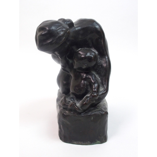 495 - A 20th Century cast bronze figure group of a mother and baby