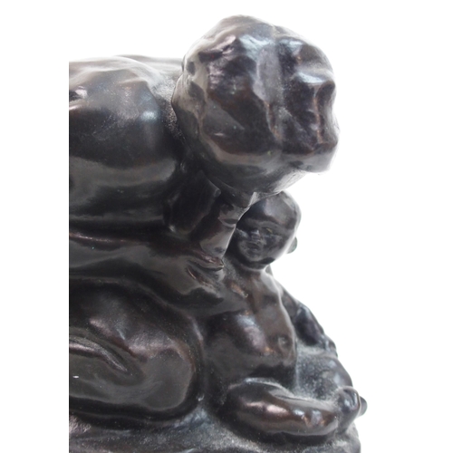 495 - A 20th Century cast bronze figure group of a mother and baby