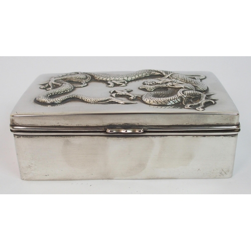 50 - A Chinese silver cigarette box and cover