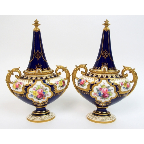 501 - A pair of Royal Crown Derby urns and covers